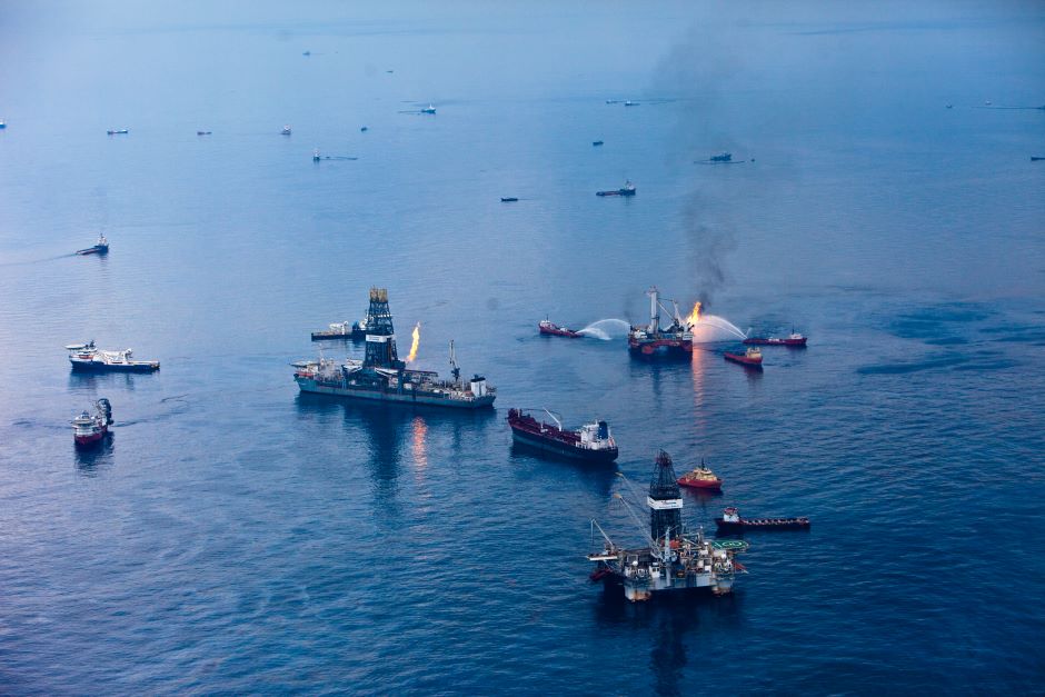 Various boats fight fires caused by the oil spill in the Gulf of Mexico