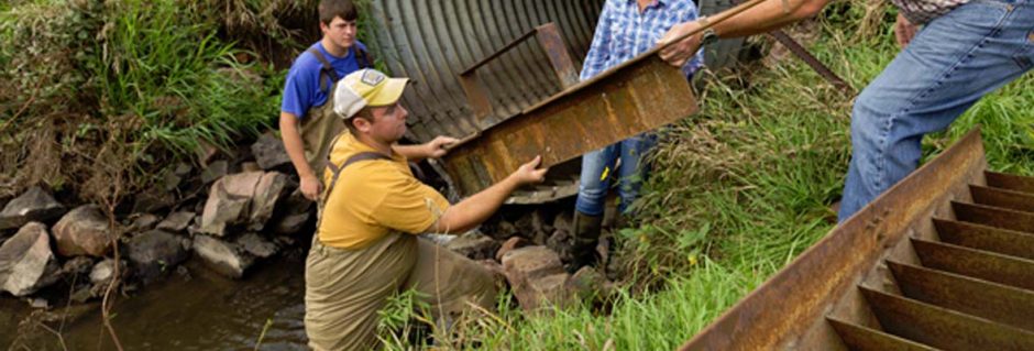 South Dakota State University scientists install a fish ladder