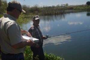 fishery manager conducting an angler survey